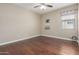 Bedroom with hardwood floors and ceiling fan at 9415 W Colter St, Glendale, AZ 85305