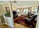 Spacious living room featuring hardwood floors and comfortable seating at 10102 W Caron Dr, Sun City, AZ 85351