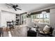 Bright dining area with sliding glass doors leading to the backyard at 10801 W El Dorado Dr, Sun City, AZ 85351