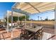 Spacious covered patio overlooking a picturesque golf course at 10801 W El Dorado Dr, Sun City, AZ 85351