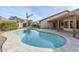 Inviting kidney-shaped pool with patio and landscaping at 140 E Dawn Dr, Tempe, AZ 85284