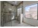 Walk-in shower with glass enclosure and seat at 140 E Dawn Dr, Tempe, AZ 85284