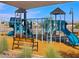 Community playground with shaded seating at 16068 W Prickly Pear Trl, Surprise, AZ 85387