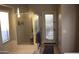 Bathroom with shower, bathtub, and door leading to backyard at 17134 N Eureka Trl, Surprise, AZ 85374