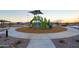 playground with play structures, slides, and swings at 17287 W Dahlia Dr, Surprise, AZ 85388