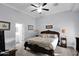 Elegant bedroom with ornate bed and ensuite bathroom at 2102 E Norwood St, Mesa, AZ 85213