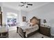 Charming bedroom with window seat and ornate bed frame at 2102 E Norwood St, Mesa, AZ 85213