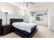 Bright bedroom with queen bed and large window at 2511 W Queen Creek Rd # 340, Chandler, AZ 85248