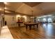 Community game room with pool table and shuffleboard at 2511 W Queen Creek Rd # 340, Chandler, AZ 85248
