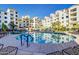 Resort-style pool and spa with surrounding patio and lounge chairs at 2511 W Queen Creek Rd # 340, Chandler, AZ 85248
