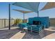 Rooftop patio with seating, a fireplace, and shade sails at 3131 N Central Ave # 6014, Phoenix, AZ 85012
