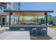 Community outdoor kitchen with grills and seating at 3131 N Central Ave # 6014, Phoenix, AZ 85012