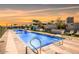 Resort-style pool with plenty of lounge chairs at 3131 N Central Ave # 6014, Phoenix, AZ 85012