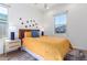 Cozy bedroom with mustard yellow bedding and natural light at 38500 N School House Rd # 66, Cave Creek, AZ 85331