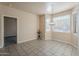 Breakfast nook with tile floors and view into the kitchen at 4202 E Broadway Rd # 132, Mesa, AZ 85206