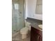 Bathroom with shower stall, toilet, and vanity with granite countertop at 517 W 17Th St, Tempe, AZ 85281