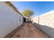 Long, narrow backyard with dirt and a small tree at 5302 N 22Nd Ave, Phoenix, AZ 85015