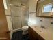 Bathroom with shower/tub combo and wood vanity at 5725 E Covina Rd, Mesa, AZ 85205