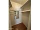 Large bedroom closet with shelving and mirror at 5725 E Covina Rd, Mesa, AZ 85205