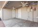 Covered patio with ceiling fans and access doors at 6110 E Ensenada St, Mesa, AZ 85205