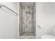 Large tiled shower with built-in shelving at 6110 E Ensenada St, Mesa, AZ 85205