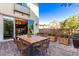 Backyard patio with rustic wooden dining table and planters at 839 S Annie Ln, Gilbert, AZ 85296