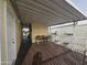 Covered deck with table and chairs at 8700 E University Dr # 545, Mesa, AZ 85207