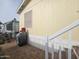 Mobile home exterior with stairs, patio, and grill at 8700 E University Dr # 545, Mesa, AZ 85207