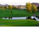 Landscaped golf course with a pond at 8700 E University Dr # 545, Mesa, AZ 85207