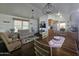 Living room with dining area and kitchen view at 8700 E University Dr # 545, Mesa, AZ 85207
