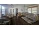 Spacious living room with wood flooring, and comfy seating at 8700 E University Dr # 545, Mesa, AZ 85207