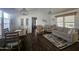 Living room with dining area and kitchen view at 8700 E University Dr # 545, Mesa, AZ 85207