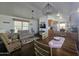Living room with dining area and kitchen view at 8700 E University Dr # 545, Mesa, AZ 85207