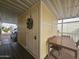 Covered patio with table, chairs, and exterior storage at 8700 E University Dr # 545, Mesa, AZ 85207