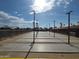 Shuffleboard courts with benches and palm trees at 8700 E University Dr # 545, Mesa, AZ 85207