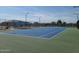 Newly resurfaced tennis court with modern lighting at 8700 E University Dr # 545, Mesa, AZ 85207