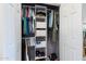 Well-organized closet with shelving and hanging space at 9707 E Mountain View Rd # 2448, Scottsdale, AZ 85258