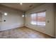 Small dining area with tile floors and window blinds at 12926 W Bloomfield Rd, El Mirage, AZ 85335