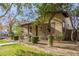 Home's exterior, showing a well-maintained lawn and garden at 15049 W Alexandria Way, Surprise, AZ 85379