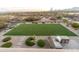 Aerial view showcases a large backyard with putting green at 15405 E Cavedale Dr, Scottsdale, AZ 85262