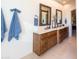Double vanity bathroom with wood cabinets and neutral tones at 15405 E Cavedale Dr, Scottsdale, AZ 85262