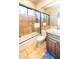 Bathroom with a shower/tub combo, toilet, and wooden vanity at 15405 E Cavedale Dr, Scottsdale, AZ 85262