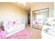 Charming bedroom with a daybed, and sliding mirrored closet doors at 15405 E Cavedale Dr, Scottsdale, AZ 85262