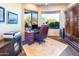 Home office boasts built-in cabinetry and scenic views at 15405 E Cavedale Dr, Scottsdale, AZ 85262