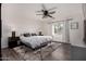 Spacious main bedroom with a ceiling fan and rug at 15949 N Cristine Ln, Surprise, AZ 85388