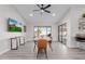 Dining area with view of backyard pool and golf course on TV at 18019 N 137Th N Dr, Sun City West, AZ 85375