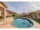 Refreshing kidney-shaped pool, perfect for summer fun at 2025 W Desert Spring Way, San Tan Valley, AZ 85144