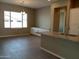 Kitchen and dining area with hardwood floors and granite counters at 21026 E Calle Luna Ct, Queen Creek, AZ 85142