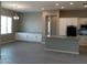 Bright dining area adjacent to the kitchen with hardwood floors at 21026 E Calle Luna Ct, Queen Creek, AZ 85142