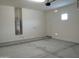 Attached garage with water heater and extra space at 21026 E Calle Luna Ct, Queen Creek, AZ 85142